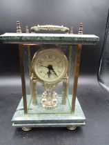 A Commodore brass and marble anniversary clock