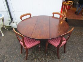 Antique mahogany drop leaf dining table and 4 upholstered chairs
