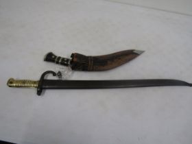 A St Etienne 1871 Bayonet with scabbard plus a Kukri in sheath with both shackles  age