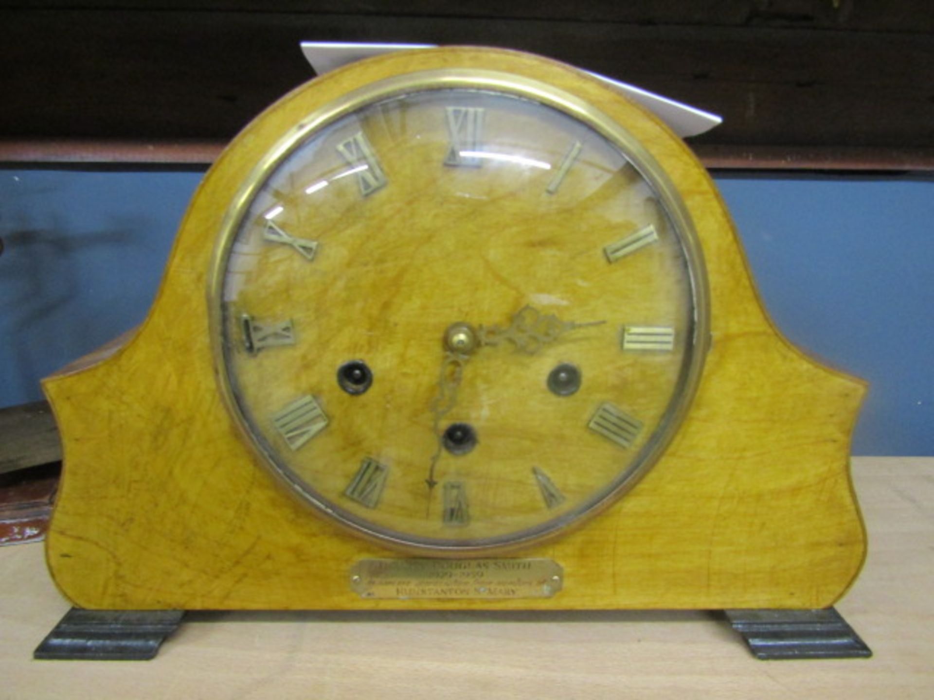 Wooden cased  mantle clock with inscription with key and pendulum