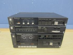 Vintage Technics amplifier, stereo tuner and cassette deck with manuals and some leads from a
