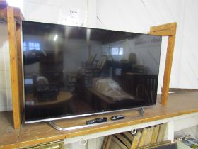 LG 55" Ultra High Definition LCD TV with remote from a house clearance