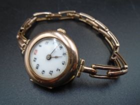 A vintage Rolex 9ct rose gold ladies coctail watch, with expanding band strap (9ct gold strap).
