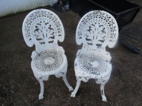 A pair cast alloy chairs