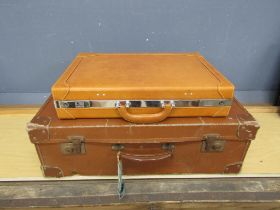 Vintage leather suitcase and briefcase with key