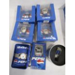 6 boxed Pepsi watches and one in tin. stock clearance