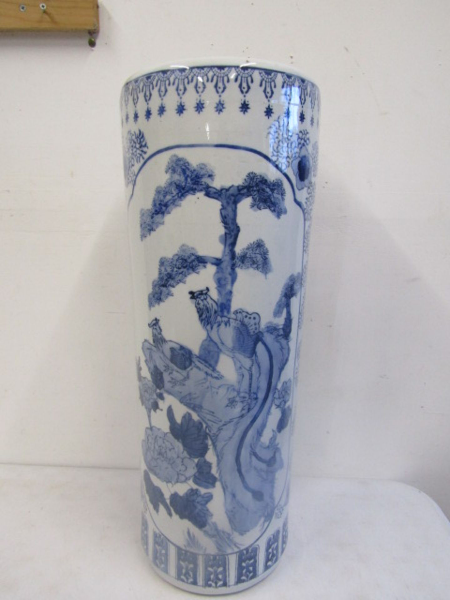 An Oriental  ceramic stick stand 62cmH