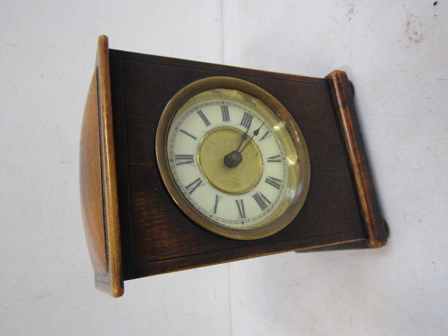 Wooden cased mantle clock with key