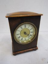 Wooden cased mantle clock with key
