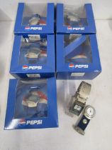 6 boxed pepsi watches, Pepsi fob watch and one unboxed