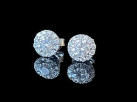 Pair of 18ct white gold claw set diamond halo cluster earrings, centre round brilliant 0.50 carat