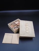 Japanese Shogi Chess set in a box incls paper board and 40 wood playing pieces