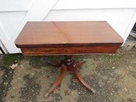Mahogany folding card table with brass Lion's paw feet and castors H73cm W92cm D45cm approx