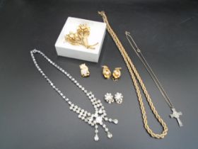 A collection of costume jewellery items to include, earings, a diamante neclace and clip-on earings,