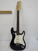 An electric guitar CBSKY solid body with strap