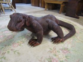 A large carved wooden Komodo Dragon 117cmL 80cm at widest point and 45cm at highest point.