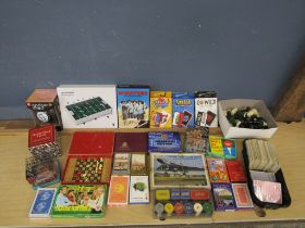 Playing cards, games, chess pieces and puzzles etc