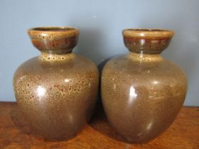 A pair of vases in mottled brown Fosters pottery style