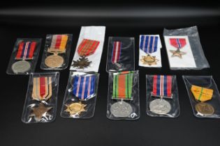 Assorted medals incl WW2 defence, Africa Star and War medal, Belgium WW1 Albert Medal, Syrian and