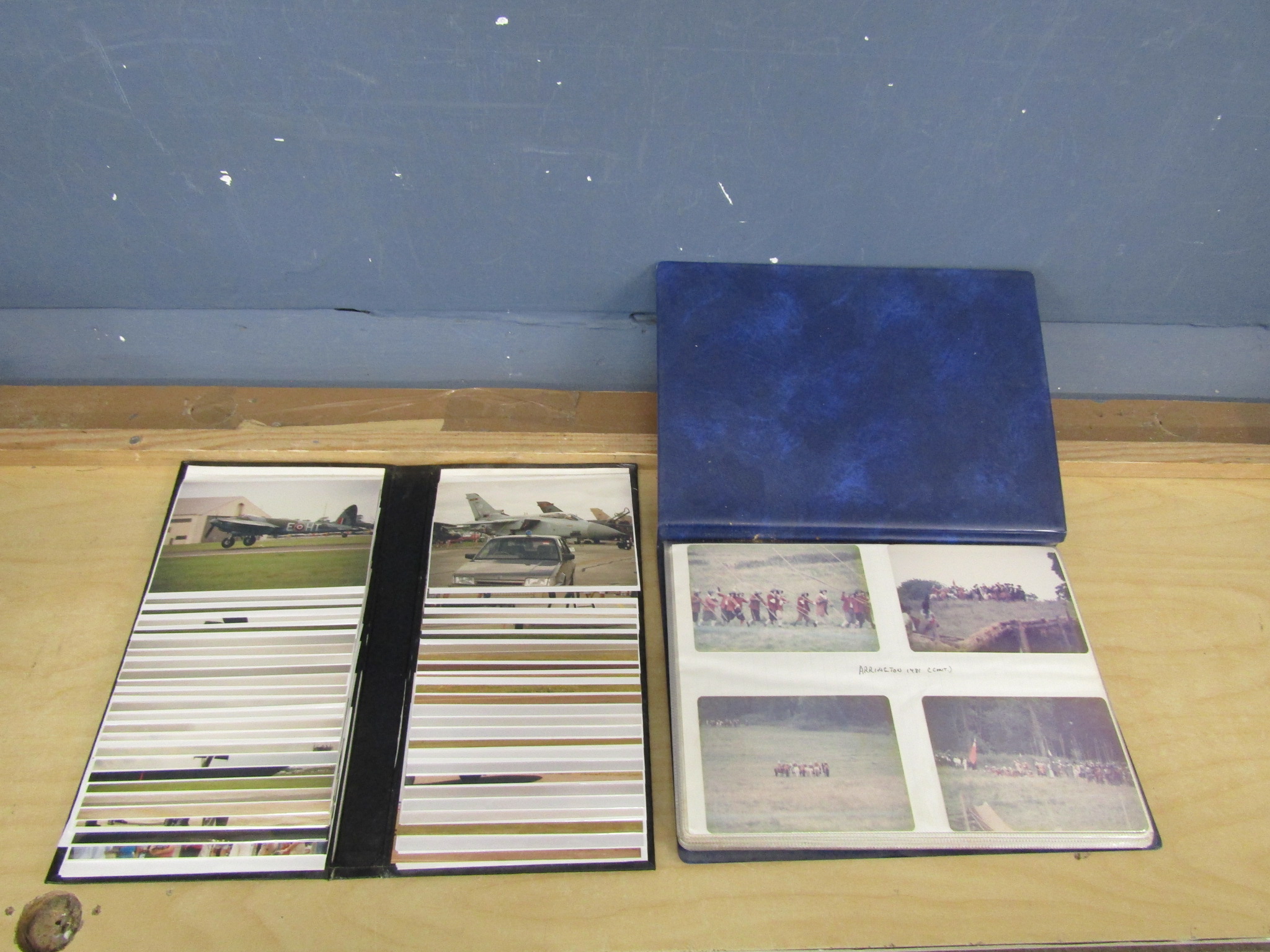 2 Photo albums, one containing vintage aircraft photo's, the other containing 1980's war re-