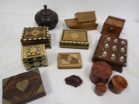 A collection of Marquetry ware boxes and treen jar