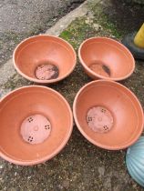 4 plastic plant pots 54cm dia