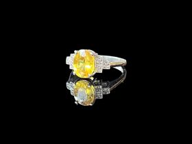 Yellow oval cut Sapphire and Diamond platinum ring, size N