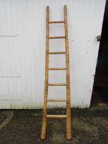 A Chinese bamboo display ladder 203cmH 45cm at widest part