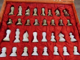 Cased onyx chess set. no board