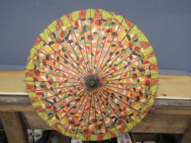 A painted wooden parasol
