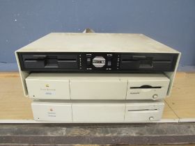 Vintage Apple Macintosh Centris 610 and 6100/66 computers and a pair of floppy drives for a BBC