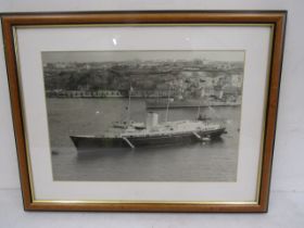 A picture of The Royal Britannia yacht on tour with a picture on verso of the escort 52x40cm