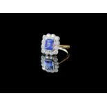 18ct gold art deco style sapphire and diamond ring, a large emerald cut sapphire (1 carat) in the