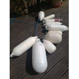 10 assorted sized white boat fenders