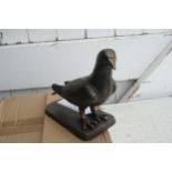 Cast pigeon on base