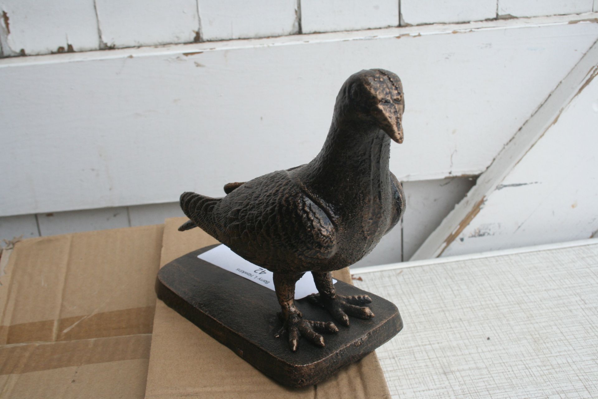 Cast pigeon on base