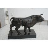 Bull figure on marble base