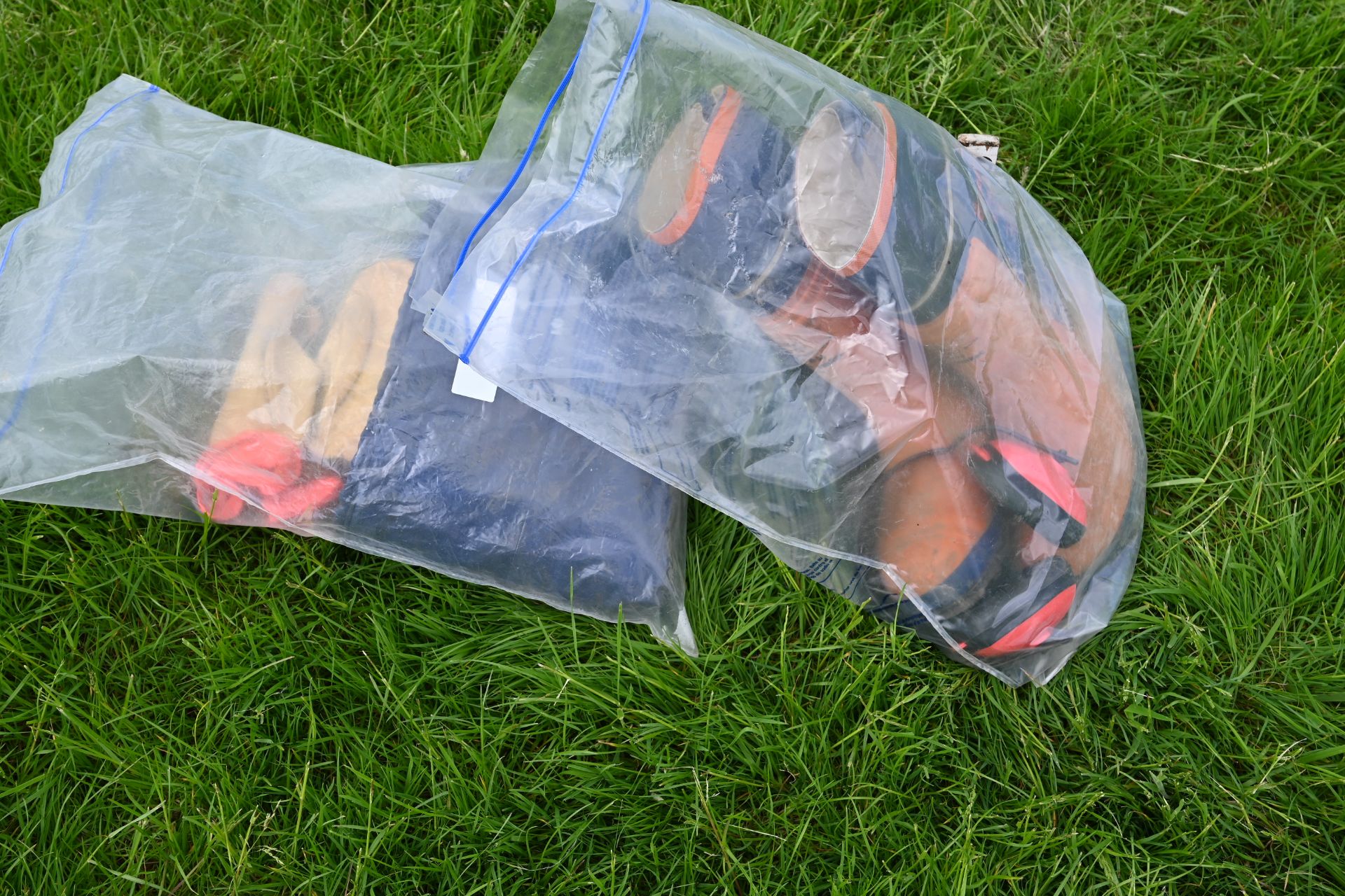 Chainsaw safety boots, trousers and glasses