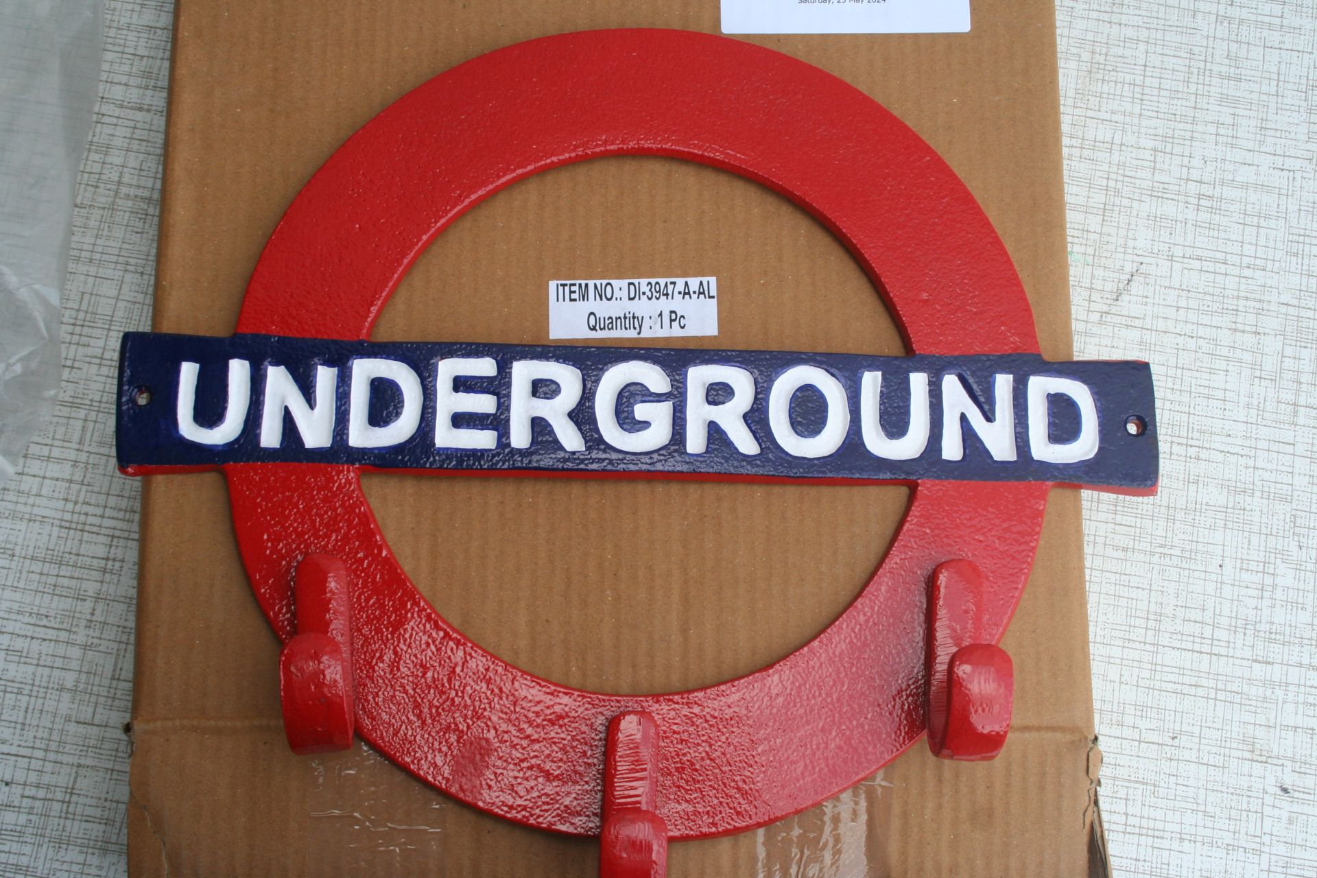 Underground sign coat rack