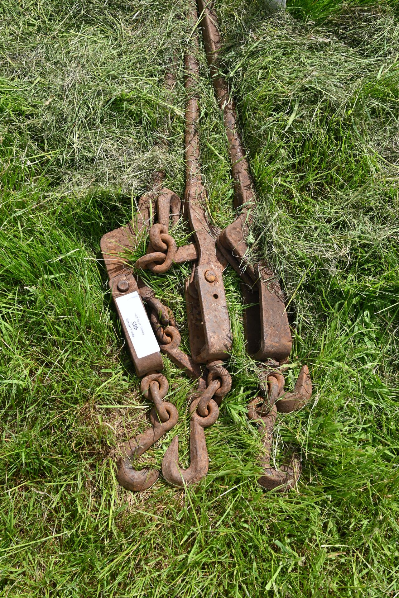 Three large chain binders