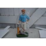 Cricketer doorstop