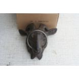 Goat head with ring