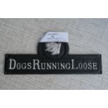 Dogs running loose sign