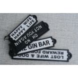 4 rectangular cast iron signs