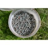 Tub of small galvanised bolts