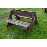 Pair of wooden garden benches constructed of ex-scaffold boards