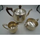 A silver Hallmarked Tea set - Tea pot, milk jug and sugar bowl - Birmingham 1927 by Adie Bros Ltd,