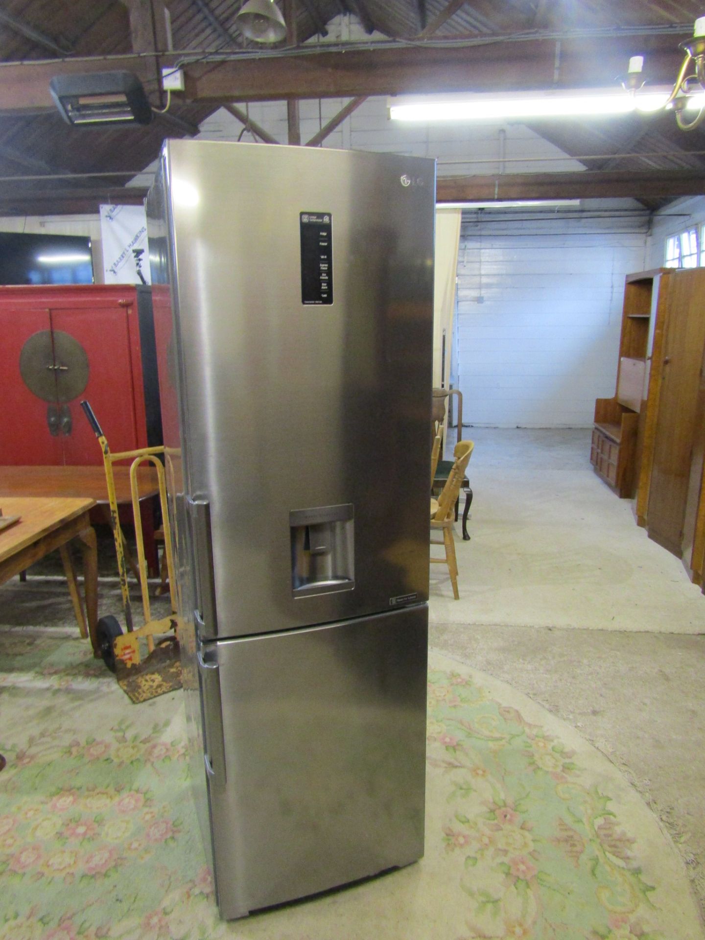 LG fridge freezer with water dispenser from a house clearance