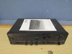 Technics stereo integrated amplifier with manual from a house clearance (no leads)