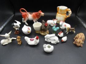 A quantity of ceramic animals inc Chicken egg cup, jug with fox handle, Jersey cow creamer